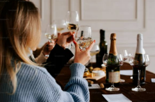 Champagne toast at a bachelorette dinner in Charleston